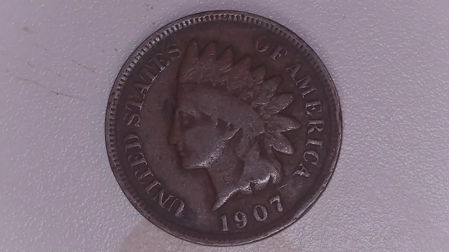 A 1907 Indian Head cent from Jen Mellen's collection, whole obverse - one of three coins of that date she holds