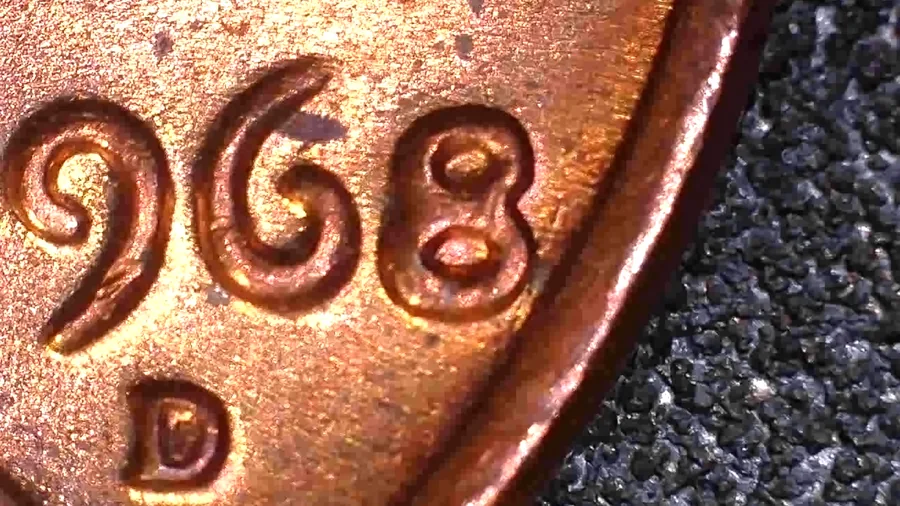 The date and D mint mark of a 1968-D Lincoln cent Jen Mellen filed as a repunched mint mark - the single letter a spot check is drawn around